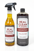 Two bottles of 'Real Clean Floors' cleaning products on a white background